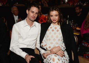BEVERLY HILLS, CA - FEBRUARY 14:  Co-founder of Snapchat Evan Spiegel (L) and model Miranda Kerr attend the 2016 Pre-GRAMMY Gala and Salute to Industry Icons honoring Irving Azoff at The Beverly Hilton Hotel on February 14, 2016 in Beverly Hills, California.  (Photo by Michael Kovac/WireImage)